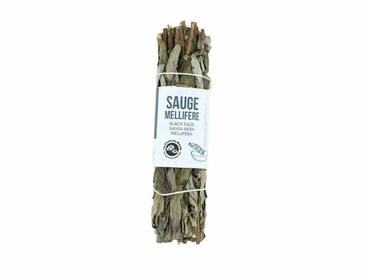 Black Melliferous Sage Smudge Stick bundle with white label, dried herbs bound with string for spiritual cleansing