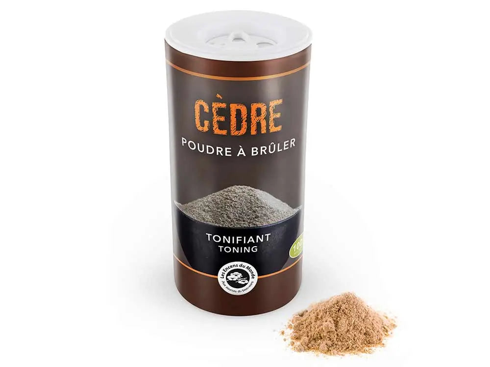 Cedar burning powder in brown cylindrical container with toning properties, showing loose powder sample