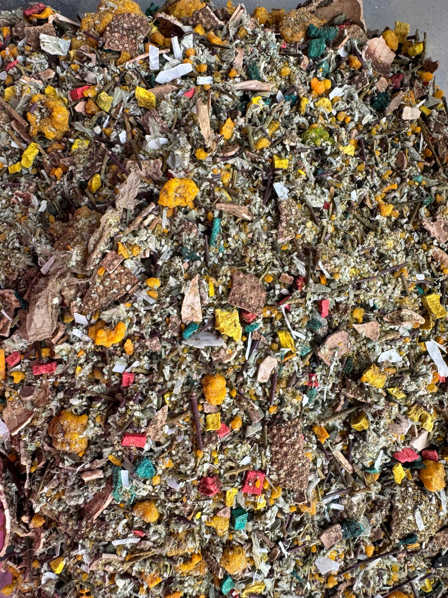 Tfoussikha harba incense blend with colorful dried herbs, flowers and resins for spiritual rituals and prosperity