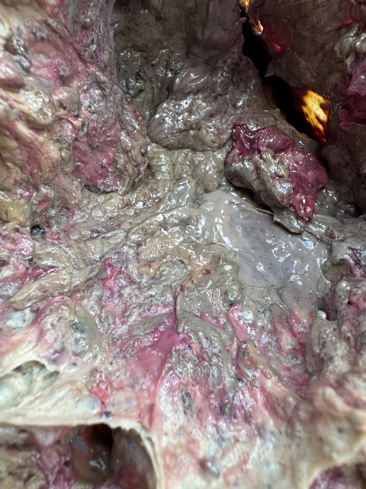 Close-up texture of Haltite resin showing pink and white crystalline formations with natural marbled patterns