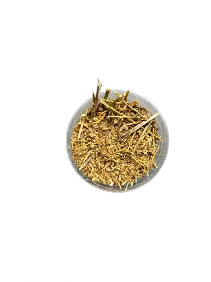 Dried Rue herb (Fijel) in glass bowl, ground yellow stems and leaves for protection incense and herbal tea