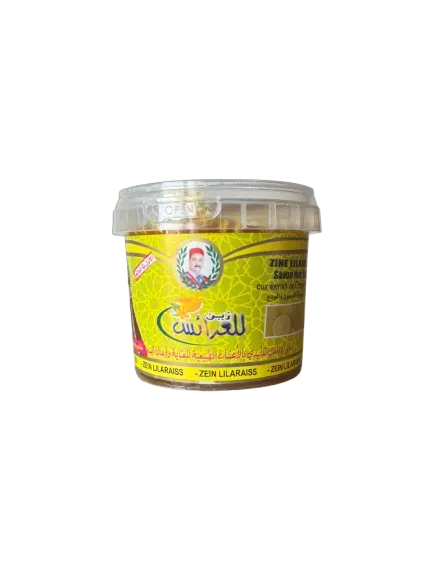 Traditional Moroccan lemon beldi soap in yellow container, natural exfoliating body and face scrub for oriental skincare