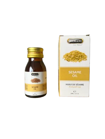 Hemani sesame oil 30ml bottle and packaging box showing product details and golden sesame seeds illustration