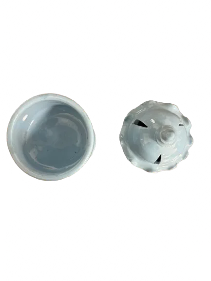 Majmar bleu ceramic incense burner in light blue glaze, showing top and bottom views with decorative vent holes