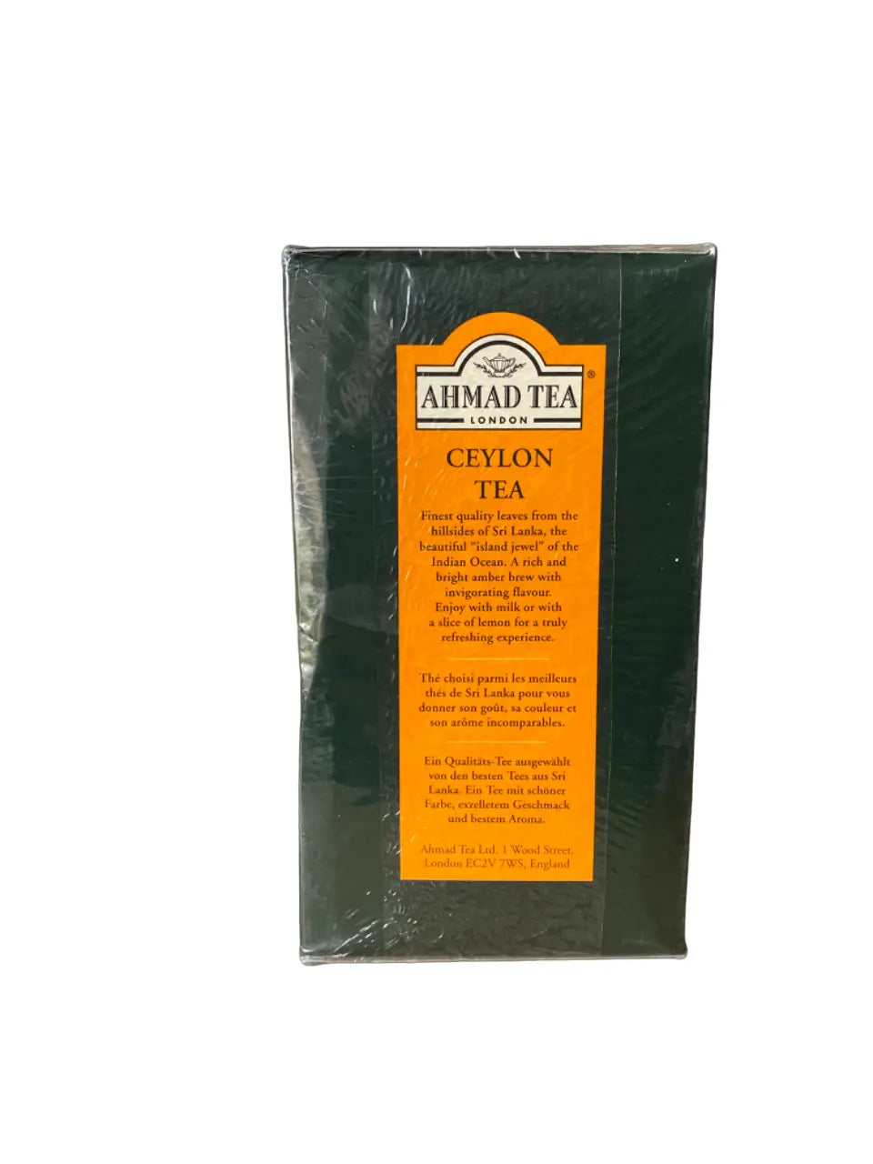 Ahmad Tea Ceylon premium loose leaf tea package featuring dark green box with orange label, displaying brand logo and product description, available in 250g and 500g sizes. Traditional Sri Lankan black tea packaging sealed in plastic wrap.