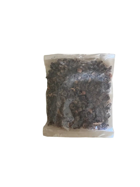 Amladj - 50g dried dark berries from Sultanate of Oman in clear plastic packaging, traditional Middle Eastern superfood with small round fruits showing natural texture and color variation