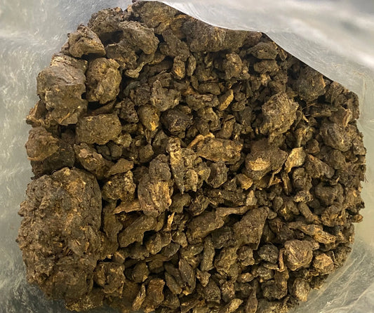 Black Fassoukh incense resin chunks in plastic bag, traditional Maghrebi purification and protection incense