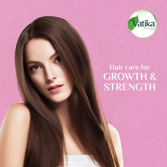 Vatika Naturals Garlic Hair Oil bottle with silky smooth long brown hair demonstrating growth and strength benefits
