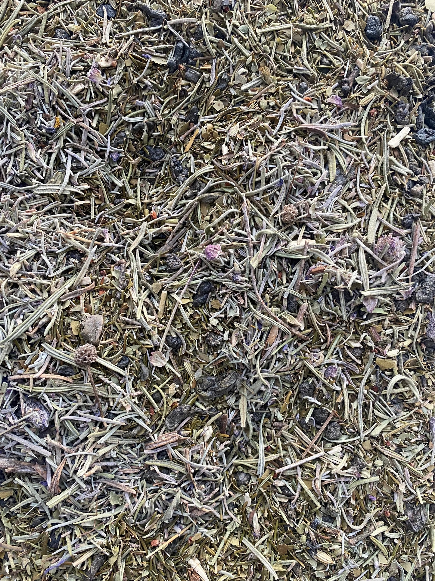 Dried Halhal (helhal) herbal blend with finely chopped leaves and dark pieces, traditional Middle Eastern spice mix, 25g