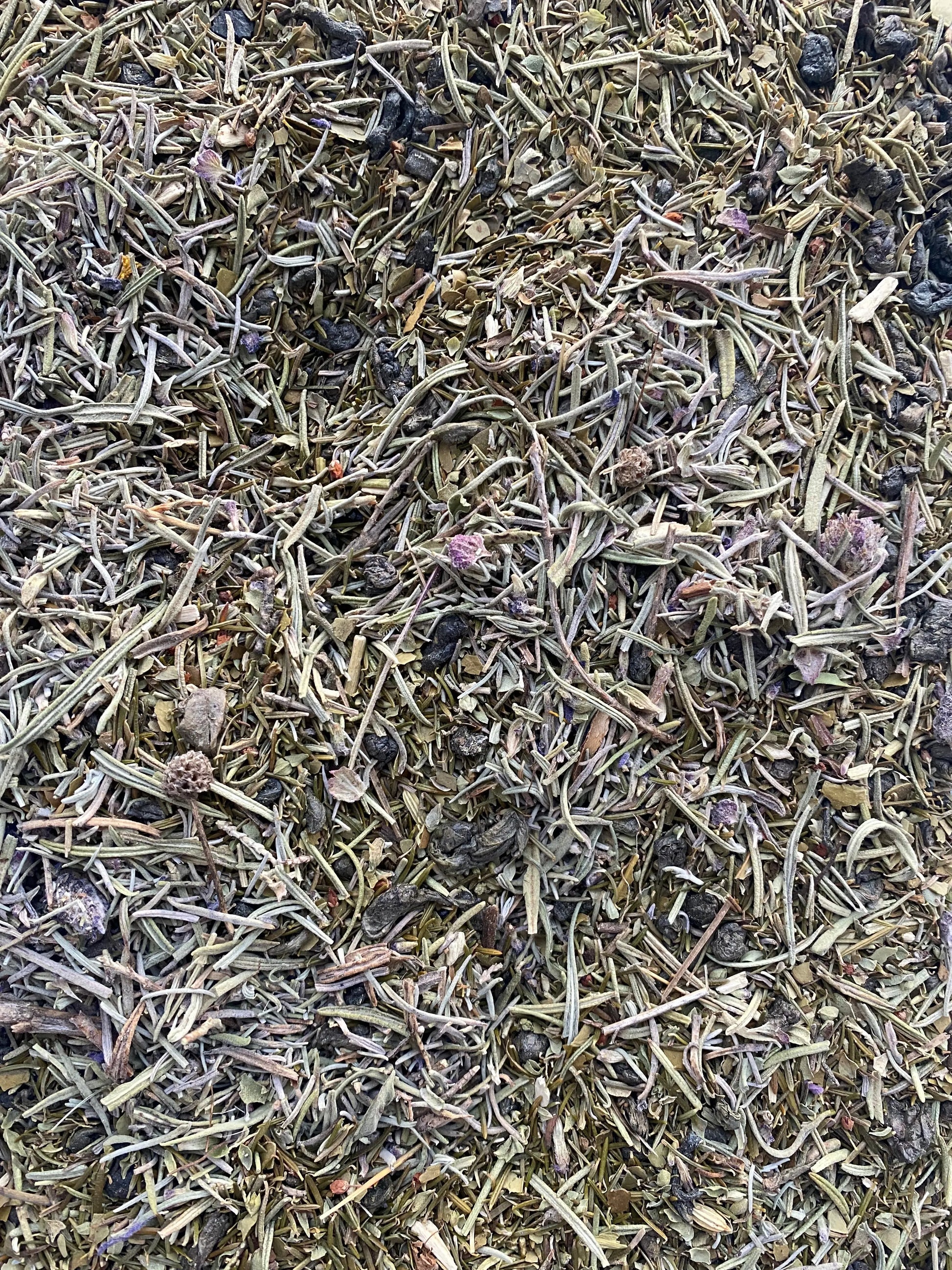 Dried Halhal (helhal) herbal blend with finely chopped leaves and dark pieces, traditional Middle Eastern spice mix, 25g