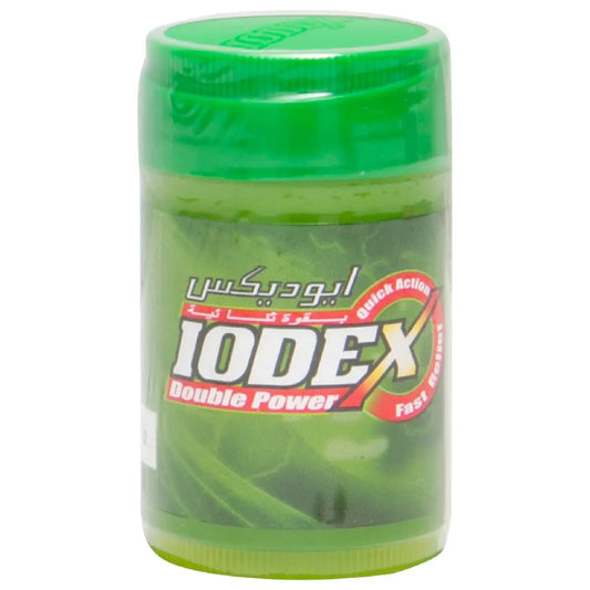 Iodex Double Power Balm 18g in translucent green container with red logo and Arabic text