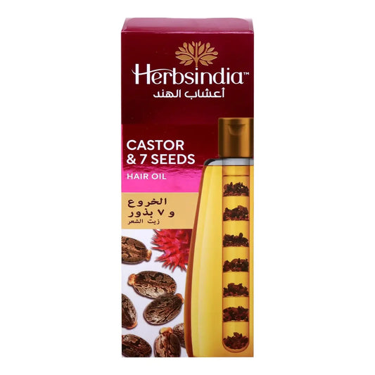 Herbsindia Castor & 7 Seeds Hair Oil bottle with maroon packaging showing golden oil and seed illustrations