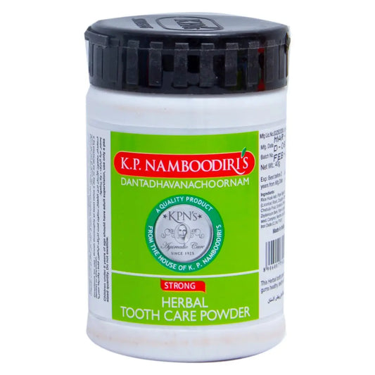 K.P Namboodiris Herbal Tooth Care Powder 40g in white plastic container with black lid and green label