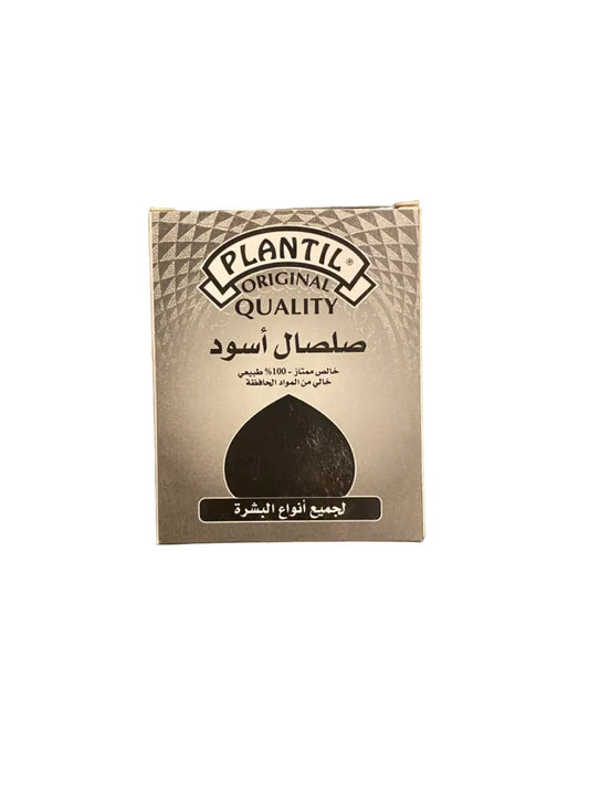 Black clay facial mask Argile noire 100g by Plantil, featuring natural mineral-rich powder for all skin types. Product packaging shows golden textured background with Arabic text and black clay sample. Traditional quality skincare treatment for purifying and toning.