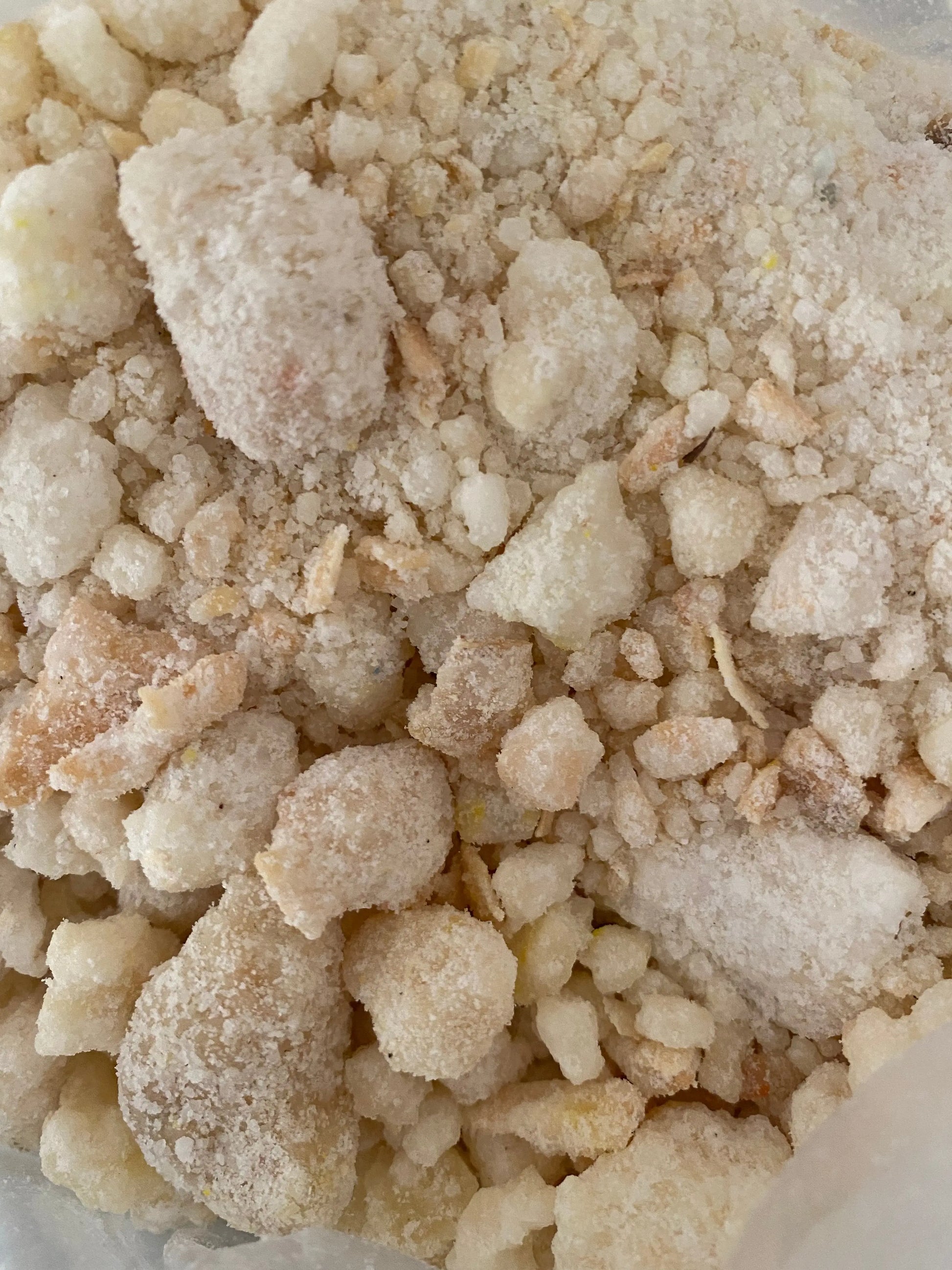 White powdered musk crystals 20g for meditation and spiritual rituals, close-up of natural aromatic incense grains