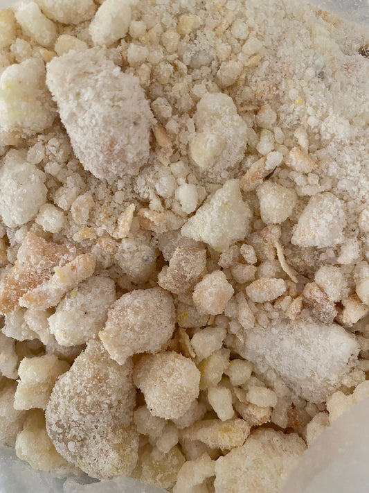White powdered musk crystals 20g for meditation and spiritual rituals, close-up of natural aromatic incense grains