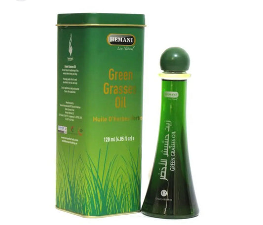 Hemani Green Grass Oil 120ml hair treatment bottle and cylindrical packaging with grass design and green color scheme