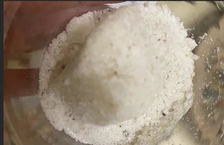 Litrun Nitrone Natron white crystalline powder in glass bowl, traditional North African antiseptic and purifying agent