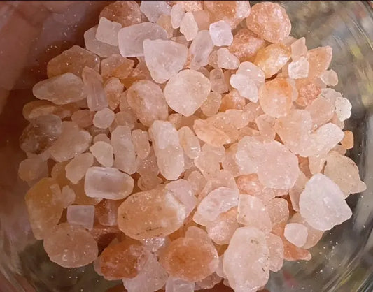 Pink Himalayan salt crystals 400g for purification and protection, displayed in glass bowl, showing natural pink hue