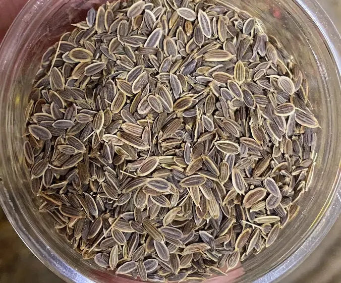 Karwiya Amya Awra 20g organic caraway seeds in clear glass bowl, showing natural brown striped seeds for cooking and seasoning