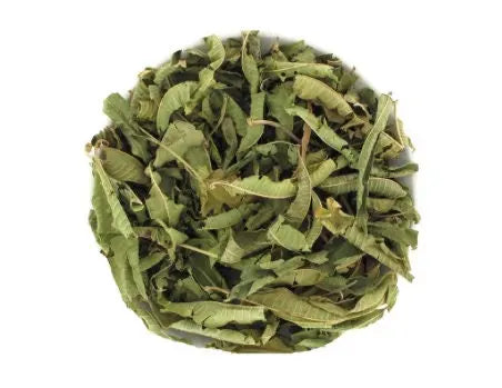 Dried Louisa Verveine herbal tea leaves arranged in circular shape, showing natural green dried herbs for relaxation